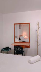 Postel nebo postele na pokoji v ubytování Convenient Resort
