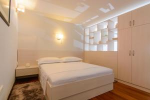 Postel nebo postele na pokoji v ubytování Luxury Apartment Kalebic