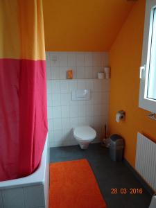 Kylpyhuone majoituspaikassa Neumühleweg 19