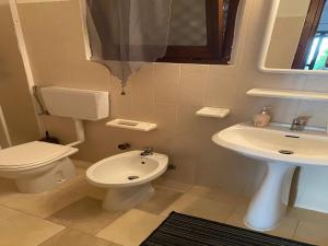 A bathroom at Apartment in Porto Pollo near Surf Paradise