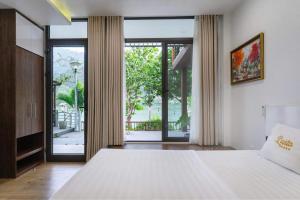 Ένα ή περισσότερα κρεβάτια σε δωμάτιο στο Lavita villa resort 2