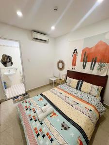 Postel nebo postele na pokoji v ubytování Hệ thống MylaHome - Chi nhánh Ks Kim Châu