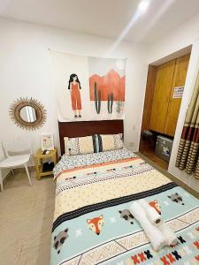 Postel nebo postele na pokoji v ubytování Hệ thống MylaHome - Chi nhánh Ks Kim Châu