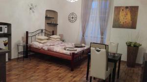 Posteľ alebo postele v izbe v ubytovaní Apartment Jakubská 676