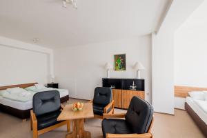 Postel nebo postele na pokoji v ubytování hotel Dobruška