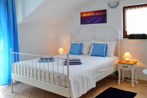 Postel nebo postele na pokoji v ubytování Holiday Home Marko Funtana