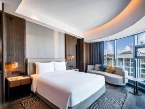 Letto o letti in una camera di Pullman Renhuai Chuangmeng