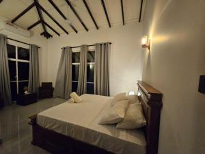 Postel nebo postele na pokoji v ubytování Temuri Resort + 29 fotografií