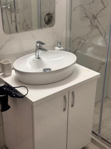 Koupelna v ubytování Comfortable Suites 1