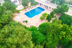 Πισίνα στο ή κοντά στο Club Mahindra Bharatpur