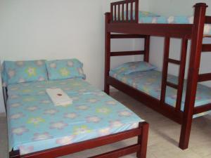 Postel nebo postele na pokoji v ubytování Hotel Real Pólux