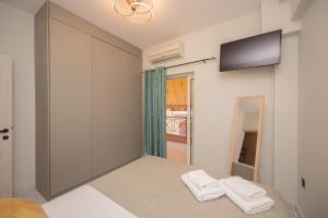 Μια τηλεόραση ή/και κέντρο ψυχαγωγίας στο Cozy Stay Preveza