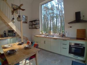 Kuchyň nebo kuchyňský kout v ubytování Gîte L'Esquirol + 29 fotografií