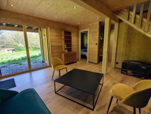 Część wypoczynkowa w obiekcie Chalet l'Appel de la Forêt