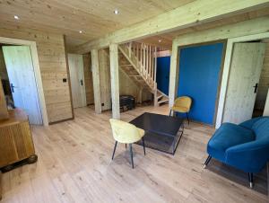 Część wypoczynkowa w obiekcie Chalet l'Appel de la Forêt