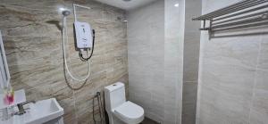 Koupelna v ubytování Enrich Hotel Semenyih by uBook + 16 fotografií