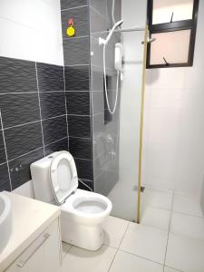 a bathroom with a toilet and a shower at Paradigm Mall Platino Apartment 2BR 2FREE By Natol in Johor Bahru