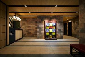 a lobby of a building with a stained glass window at Minn Nihonbashi in Tokyo
