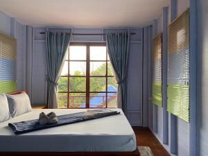 Postel nebo postele na pokoji v ubytování Koh Rong Love Camp