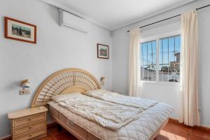 Postel nebo postele na pokoji v ubytování Casa Picasso - Ciudad Quesada, Alicante