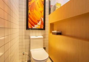 Koupelna v ubytování Happy Inn-Zhengzhou Railway St ation Erqi Square Branch喜鹊愉家酒店锦荣国际轻纺城店