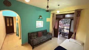 Posezení v ubytování Muffys Holiday Apartment + 33 fotografií