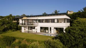 an aerial view of a large white house at Theunieskraal Nkwazi Ridge Estate in Zinkwazi Beach