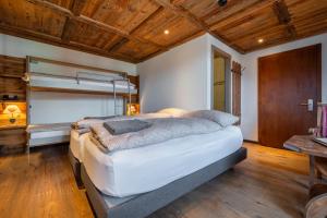 Postel nebo postele na pokoji v ubytování Hôtel Le Grand Chalet