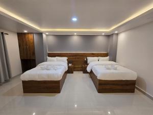 Postel nebo postele na pokoji v ubytování Hotel Kavaana