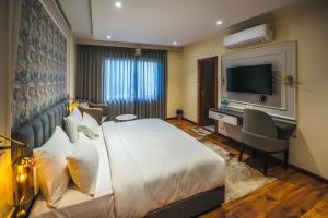 New Hotel Snow Crest客房内的一张或多张床位