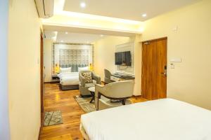 New Hotel Snow Crest客房内的一张或多张床位