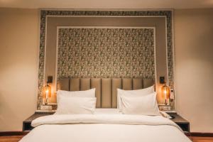 New Hotel Snow Crest客房内的一张或多张床位