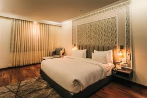 New Hotel Snow Crest客房内的一张或多张床位