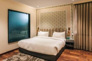 New Hotel Snow Crest客房内的一张或多张床位