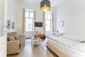 Łóżko lub łóżka w pokoju w obiekcie Chic Apartment- Suitable for Longstays near Matzleinsforferplatz