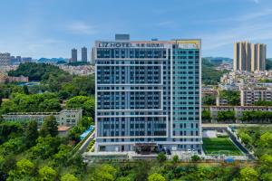 Foto sihtkohas Guangzhou asuva majutusasutuse LIZ International Hotel Guangzhou Olympic Sports Center International Financial City Branch - Free Shuttle Bus to Canton Fair Complex During Canton Fair Period & Free Breakfast & Free Afternoon Tea & Free Midnight Snack galeriist