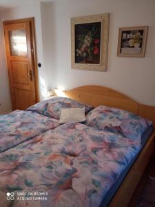 Postel nebo postele na pokoji v ubytování Pension Fanlor