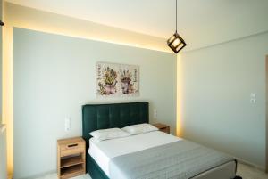A bed or beds in a room at Meteora House with a view