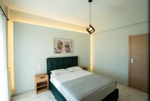 A bed or beds in a room at Meteora House with a view