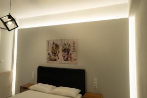 A bed or beds in a room at Meteora House with a view