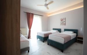 A bed or beds in a room at Meteora House with a view