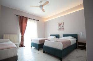 A bed or beds in a room at Meteora House with a view