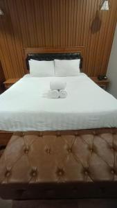 Postel nebo postele na pokoji v ubytování Thuan Phat Hostel