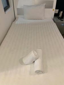 Postel nebo postele na pokoji v ubytování Thuan Phat Hostel