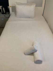 Postel nebo postele na pokoji v ubytování Thuan Phat Hostel