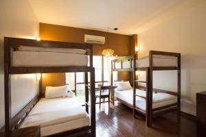Postel nebo postele na pokoji v ubytování Eco Resort Chiang Mai