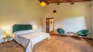 Giường trong phòng chung tại Villa La Spina