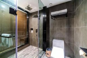 Foto sihtkohas Guangzhou asuva majutusasutuse LIZ International Hotel Guangzhou Olympic Sports Center International Financial City Branch - Free Shuttle Bus to Canton Fair Complex During Canton Fair Period & Free Breakfast & Free Afternoon Tea & Free Midnight Snack galeriist