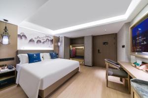 Foto sihtkohas Guangzhou asuva majutusasutuse LIZ International Hotel Guangzhou Olympic Sports Center International Financial City Branch - Free Shuttle Bus to Canton Fair Complex During Canton Fair Period & Free Breakfast & Free Afternoon Tea & Free Midnight Snack galeriist