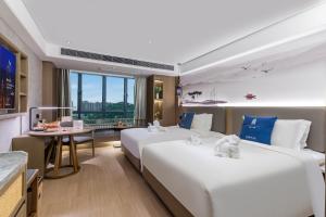 Foto sihtkohas Guangzhou asuva majutusasutuse LIZ International Hotel Guangzhou Olympic Sports Center International Financial City Branch - Free Shuttle Bus to Canton Fair Complex During Canton Fair Period & Free Breakfast & Free Afternoon Tea & Free Midnight Snack galeriist